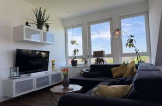 Wohnung kaufen in 33758 Schloß Holte-Stukenbrock, Einziehen und wohlfühlen – Stilvolle Dachgeschosswohnung mit Gartenanteil und Garage