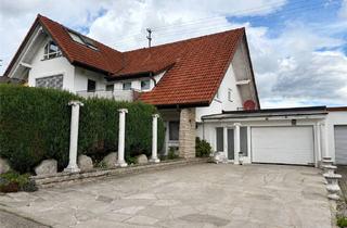 Wohnung kaufen in 73489 Jagstzell, Stilvolle Erdgeschosswohnung mit zwei überdachten Terrassen und mediterranem Wohnflair