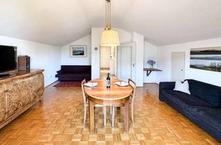 Wohnung kaufen in 83209 Prien, Charmante Dachgeschosswohnung mit Garage und Potenzial in zentraler Lage
