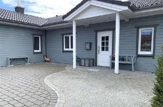Haus kaufen in 23758 Gremersdorf, Moderner Wohntraum aus Holz in Feldrandlage - barrierefreier Bungalow