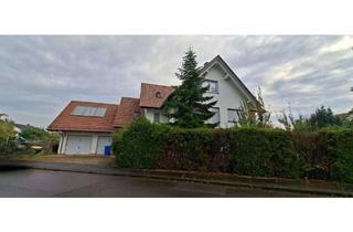 Haus kaufen in 35274 Kirchhain, Stilvolle Immobilie mit drei Einheiten, hochwertiger Ausstattung und Garten in Kirchhain