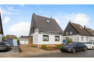 Haus kaufen in 46145 Sterkrade-Nord, Ideal für Mehrgenerationen: Zweifamilienhaus mit großem Außenbereich und zwei Garagen