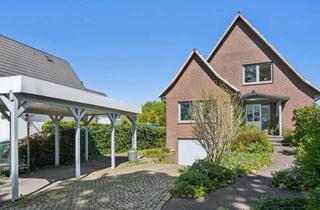 Haus kaufen in 25436 Moorrege, Ein Ort zum Wohlfühlen – Familienhaus mit viel Platz und schöner Gartenanlage