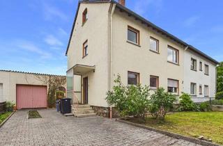 Doppelhaushälfte kaufen in 65385 Rüdesheim am Rhein, Familienfreundliche Doppelhaushälfte mit Garten, Terrasse und Garage