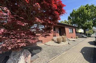 Haus kaufen in 50259 Pulheim, Wohnen in Dansweiler. Modernisierter Bungalow in zentraler Lage !