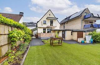 Einfamilienhaus kaufen in 50259 Pulheim, Gepflegtes Einfamilienhaus in zentraler Lage von Pulheim mit Garage und Garten