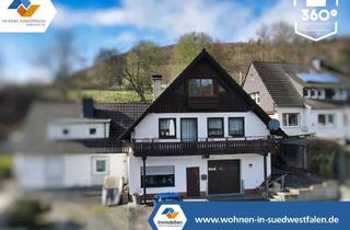 Einfamilienhaus kaufen in 58840 Plettenberg, VR IMMO: Rechtlich Wohnung – gefühlt Einfamilienhaus mit Traumgarage für Autoliebhaber.
