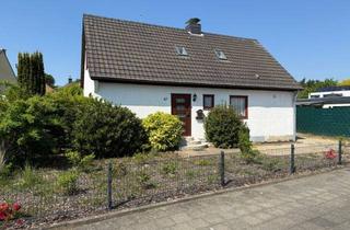 Einfamilienhaus kaufen in 41542 Dormagen, freistehendes Einfamilienhaus mit Garage in ruhiger Wohngegend mit zusätzlichem Baugrundstück