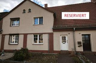 Reihenhaus kaufen in Ringweg 26, 06772 Zschornewitz, Reserviert: Schönes Reihenhaus in historischer Werkssiedlung Zschornewitz mit Fertigstellungsbedarf