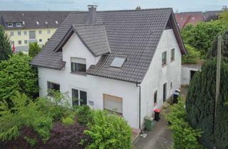 Einfamilienhaus kaufen in 32584 Löhne, Ihr Projekt wartet: Modernisierungsbedürftiges Zweifamilienhaus auf großem Grundstück in Löhne