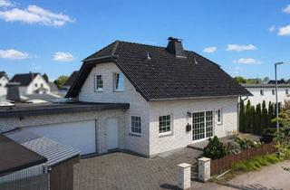 Einfamilienhaus kaufen in 32584 Löhne, Löhne - Freistehend & solide: Einfamilienhaus mit außergewöhnlich viel Nutzfläche und Garagen in Löhne-Ort