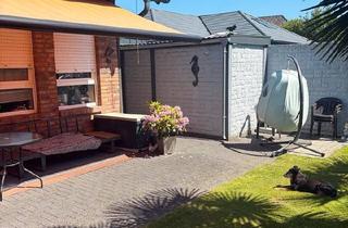 Wohnung kaufen in 41379 Brüggen, Brüggen - Eigentumswohnung in Brüggen-Born - 96 m² mit Garten und Carport