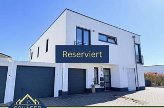 Wohnung kaufen in 66773 Schwalbach, Attraktive Erdgeschosswohnung mit Top-Ausstattung, Garage und Garten in Schwalbach-Hülzweiler