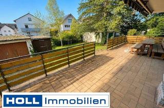 Wohnung kaufen in 63165 Mühlheim, Außergewöhnliche ETW mit Garten und Garage - Ideal für Familien mit Ideen!