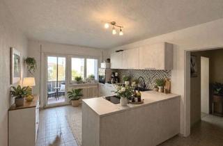 Wohnung kaufen in 67354 Römerberg, Erdgeschosswohnung mit 2 Balkonen und Garage in kleiner Einheit