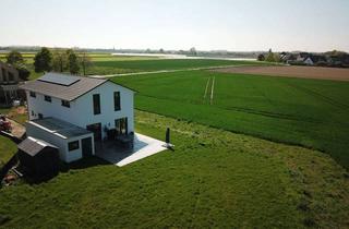 Haus kaufen in 41564 Kaarst, Exklusives Wohnerlebnis mit Weitblick: Modernes Anwesen in unverbaubarer Feldrandlage von Kaarst
