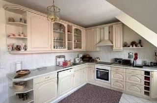 Wohnung kaufen in Goslarsche Straße 16, 38667 Bad Harzburg, Stilvolle Maisonettewohnung mit Süd-Balkon, zwei TG-Stellplätzen & hochwertiger Ausstattung