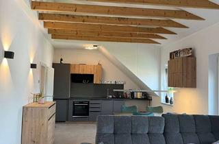 Wohnung mieten in 67550 Herrnsheim, Moderne 3-Zimmer-Dachgeschosswohnung mit Balkon und sichtbaren Holzbalken