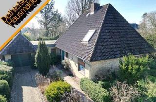Einfamilienhaus kaufen in 25746 Heide, Großzügiges Einfamilienhaus mit massiver Garage in ruhiger Seitenstraßenlage im "alten Heide-Ost"