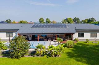 Haus kaufen in 16259 Falkenberg, Moderner Bungalow in Falkenberg - Mit Einbauküchen, Fußbodenheizung, Photovoltaik, Pool, Garagen