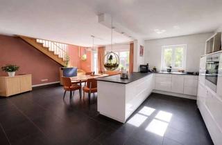 Wohnung kaufen in 63773 Goldbach, Moderne Traumwohnung mit Gartenanteil und Garage