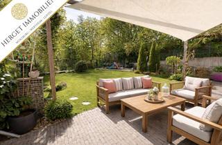 Wohnung kaufen in 63773 Goldbach, Moderne Traumwohnung mit Gartenanteil und zwei Stellplätzen