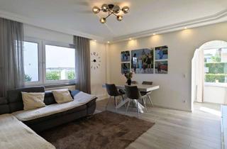 Wohnung kaufen in 65474 Bischofsheim, Modernisierte 3-Zimmer-Wohnung mit Garten, Terrasse & direktem Gartenzugang in ruhiger Lage