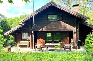Haus kaufen in 21369 Nahrendorf, Pommoissel: Gemütliches Holzhaus mit Südterrasse, 3 separaten Schlafzimmern und Garage