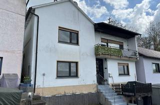 Einfamilienhaus kaufen in 67822 Münsterappel, Gepflegtes Wohnhaus mit Panoramablick und Entwicklungspotenzial
