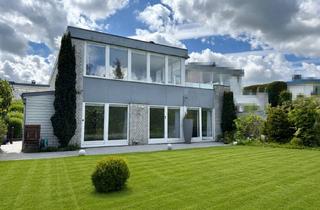 Doppelhaushälfte kaufen in 24944 Flensburg, Lichtdurchflutete Architektenhaushälfte - großzügiges Wohnen auf zwei Ebenen in Flensburg