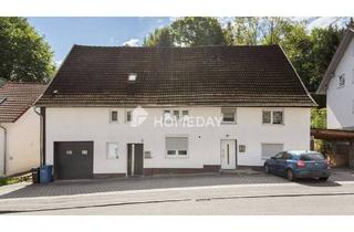 Einfamilienhaus kaufen in 88453 Erolzheim, Erolzheim - Charmantes Einfamilienhaus mit 11 Zimmern, viel Nutzfläche und attraktiver Vermietung