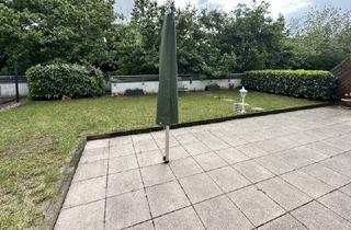 Wohnung kaufen in 61184 Karben, Karben - Schicke 3 Zimmer-Eigentumswohnung mit Wintergarten und Garten in ruhiger Zentrumslage von Karben