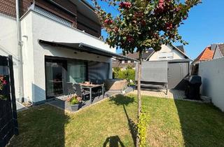 Wohnung kaufen in 34225 Baunatal, Baunatal - Großzügige ebenerdige Eigentumswohnung mit Garten