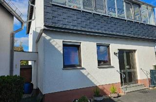 Einfamilienhaus kaufen in 56729 Ettringen, Ettringen - Einfamilienhaus mit Wintergarten, Nebengebäude, Sauna & 3 Garagen