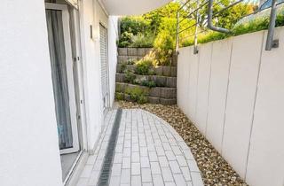 Wohnung kaufen in 76698 Ubstadt-Weiher, Ubstadt-Weiher - Helle 2-Zimmer-Wohnung mit Terrasse und 1,5 Stellplätzen