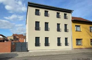 Mehrfamilienhaus kaufen in 19322 Wittenberge, Top saniertes Mehrfamilienhaus mit 4 Wohnungen, Balkonen und Terrasse – Kapitalanlage in Wittenberge
