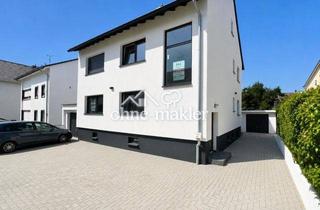 Mehrfamilienhaus kaufen in Friedrich-Ebert-Straße 68, 64390 Erzhausen, PROVISIONSFREI - Moderne Eleganz trifft flexible Nutzungsmöglichleiten