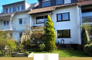 Haus kaufen in 61118 Bad Vilbel, Raumwunder in Bad Vilbel Heilsberg - Reihenmittelhaus mit Garten, Balkon und Keller