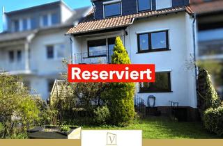 Haus kaufen in 61118 Bad Vilbel, Raumwunder in Bad Vilbel Heilsberg - Reihenmittelhaus mit Garten, Balkon und Keller