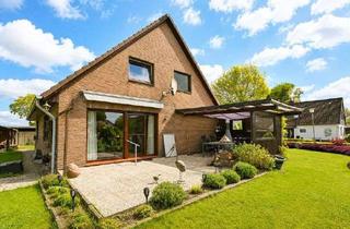 Haus kaufen in 24632 Heidmoor, Idyllisches Familienhaus mit 4 Zimmern, Naturteich, Sauna & traumhaftem Garten