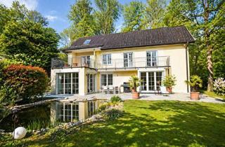 Einfamilienhaus kaufen in 61350 Bad Homburg, Charmantes Einfamilienhaus mit großzügigen Terrassen und viel Platz für die Familie