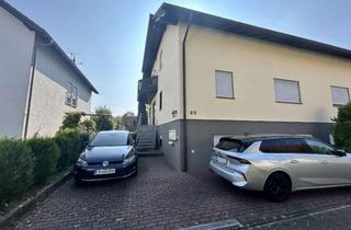Doppelhaushälfte kaufen in 61184 Karben, Attraktive Kapitalanlage in Karben – Voll vermietete Doppelhaushälfte mit 3 Wohneinheiten!