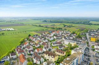 Wohnung kaufen in 68723 Oftersheim, HAUSGEFÜHL MIT PRIVATGARTEN – Stilvolle Maisonettewohnung mit ca. 200 m² Garten & Garage