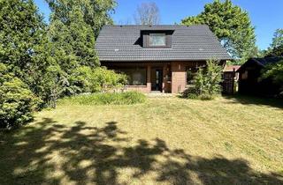 Einfamilienhaus kaufen in 25746 Lohe-Rickelshof, Einfamilienhaus mit Garage und großem Garten