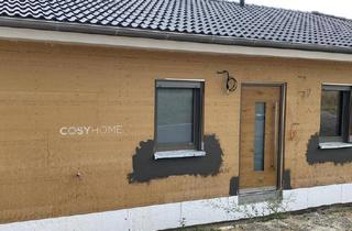 Haus kaufen in 96132 Schlüsselfeld, Moderner Bungalow mit überdachter Veranda und Garage - naturnah wohnen mit durchdachtem Wohnkonzept