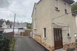 Einfamilienhaus kaufen in Käthe-Kollwitz-Straße 15, 08223 Falkenstein, Wohnhaus (Doppelhaushälfte) mit 2 Garagen und viel Nebengelass