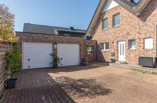 Doppelhaushälfte kaufen in Wiggerstrasse 17C, 46399 Bocholt, Überraschend großzügige Doppelhaushälfte mit Souterrain, Doppelgarage, Abstellraum und Garten.