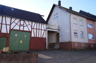 Einfamilienhaus kaufen in 56290 Beltheim, Großzügiges Einfamilienhaus mit Scheune, Doppelgarage und großem Grundstück in ruhiger Ortsrandlage