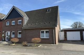 Doppelhaushälfte kaufen in 23569 Lübeck, Charmante Doppelhaushälfte mit großem Sonnengrundstück und Garage