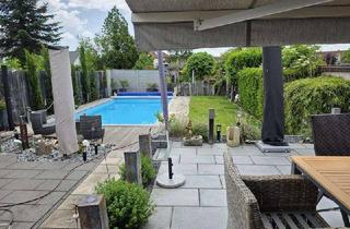 Haus kaufen in 67454 Haßloch, Modern saniertes Zweifamilienhaus auf großen Grundstück mit Pool und Garage